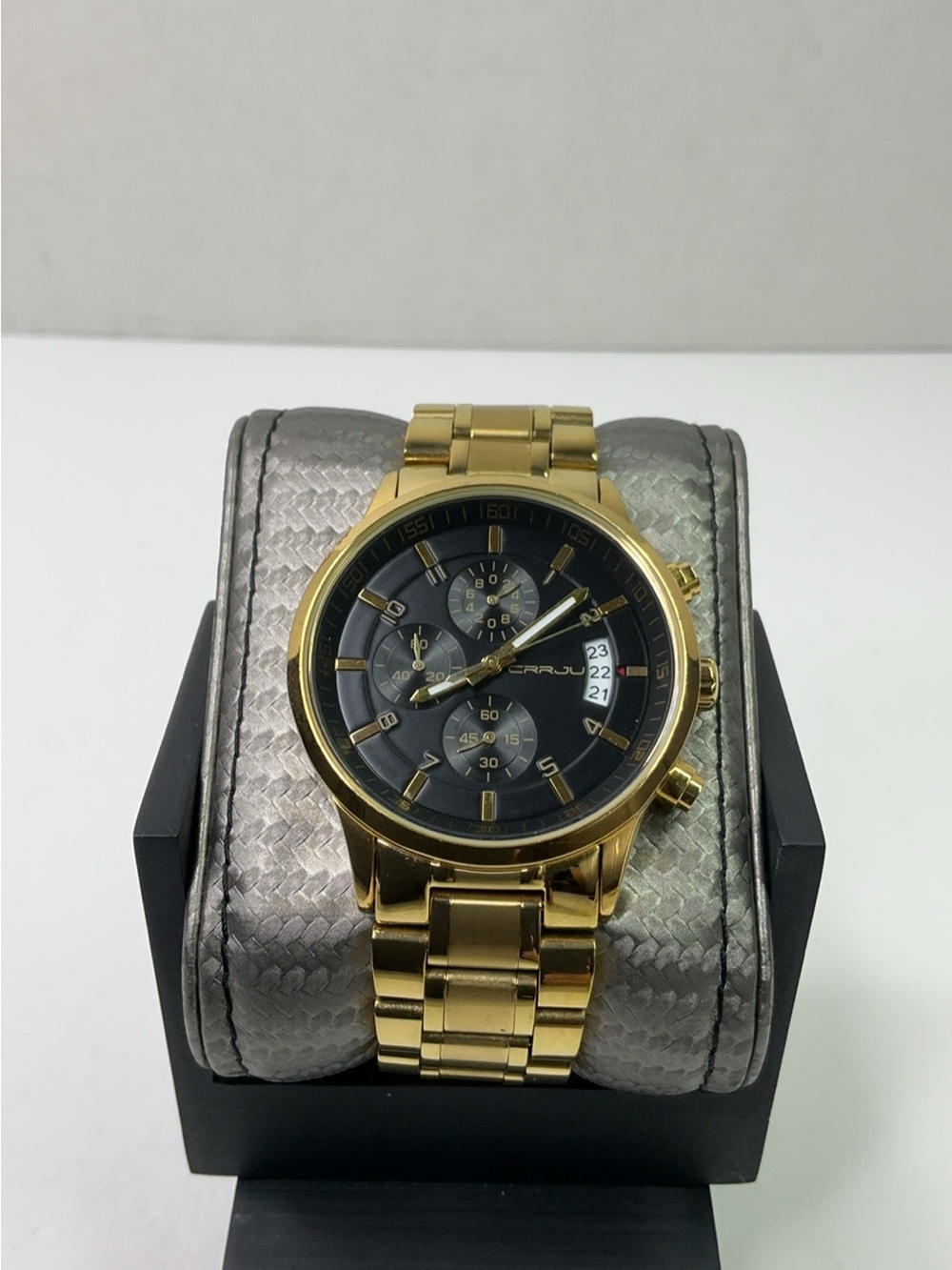 CRRJU fashion watch features a gold-tone stainless steel